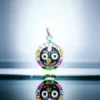 Silver Jagannath locket featuring the Nila Chakra, a symbol of divine protection and a perfect gift for devotees.