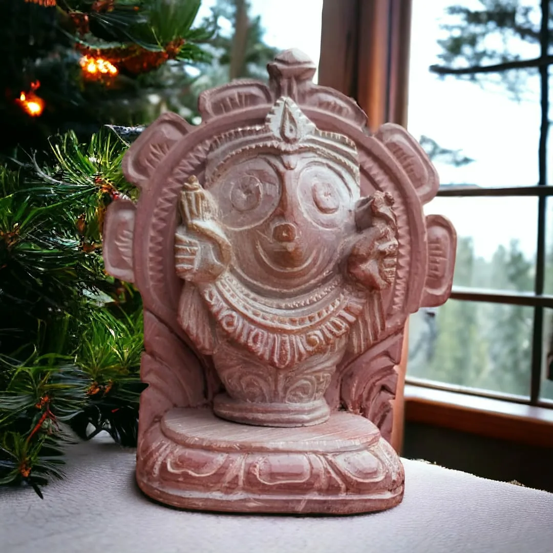 Welcome the divine presence of Lord Jagannath with this exquisite Stone Murti, handcrafted with intricate details.