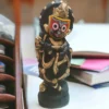 Marble Murti depicting Lord Krishna, a beloved deity in Hinduism known for his love, compassion, and playful nature.