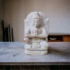 Garuda Stone Murti placed on an altar, enhancing the sacred space with its presence.