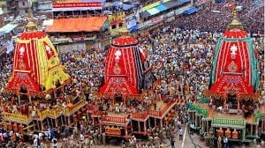 Three large red and gold chariots in a crowded scene, featured in the Ratha Jatra article