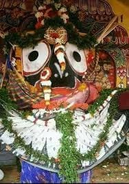 Vibrant intricately decorated figure on a black background, featured in the Tulsi Das article