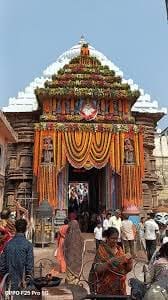 Temple entrance with people, featured in the Niljala Ekadashi article