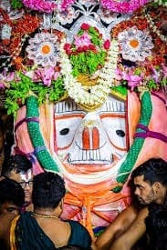Colorful cultural display with a person standing in front, featured in the Gahma Purnima article